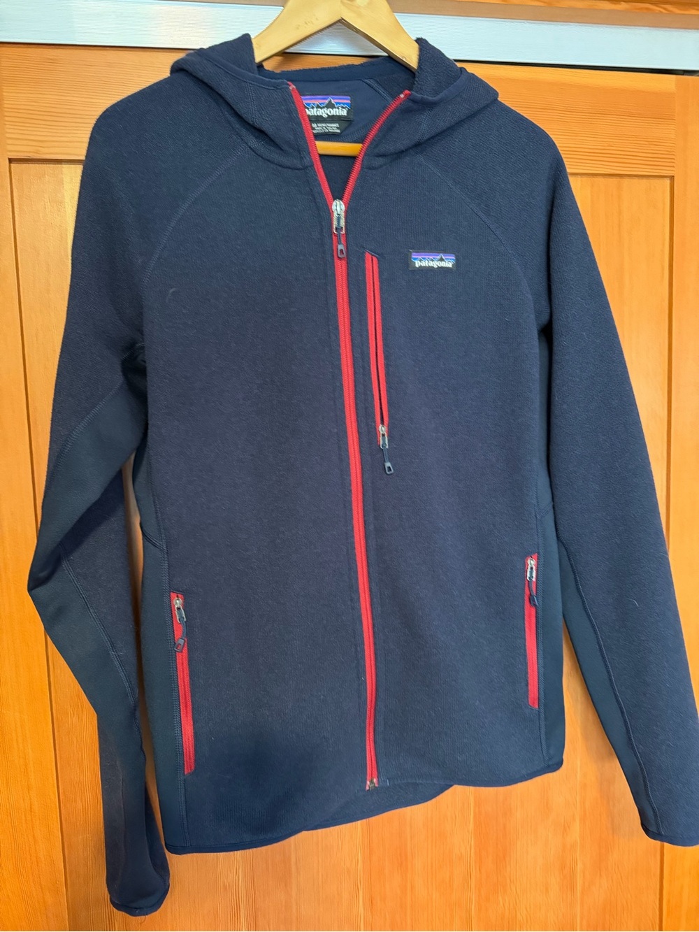 Patagonia Mens Navy Hoodie with Red Zipper Accents